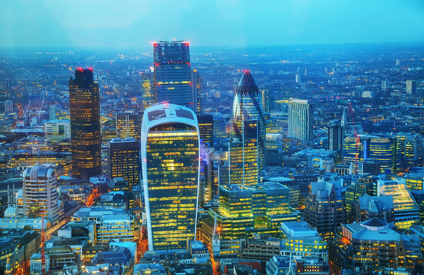 Photo of the London skyline at night.