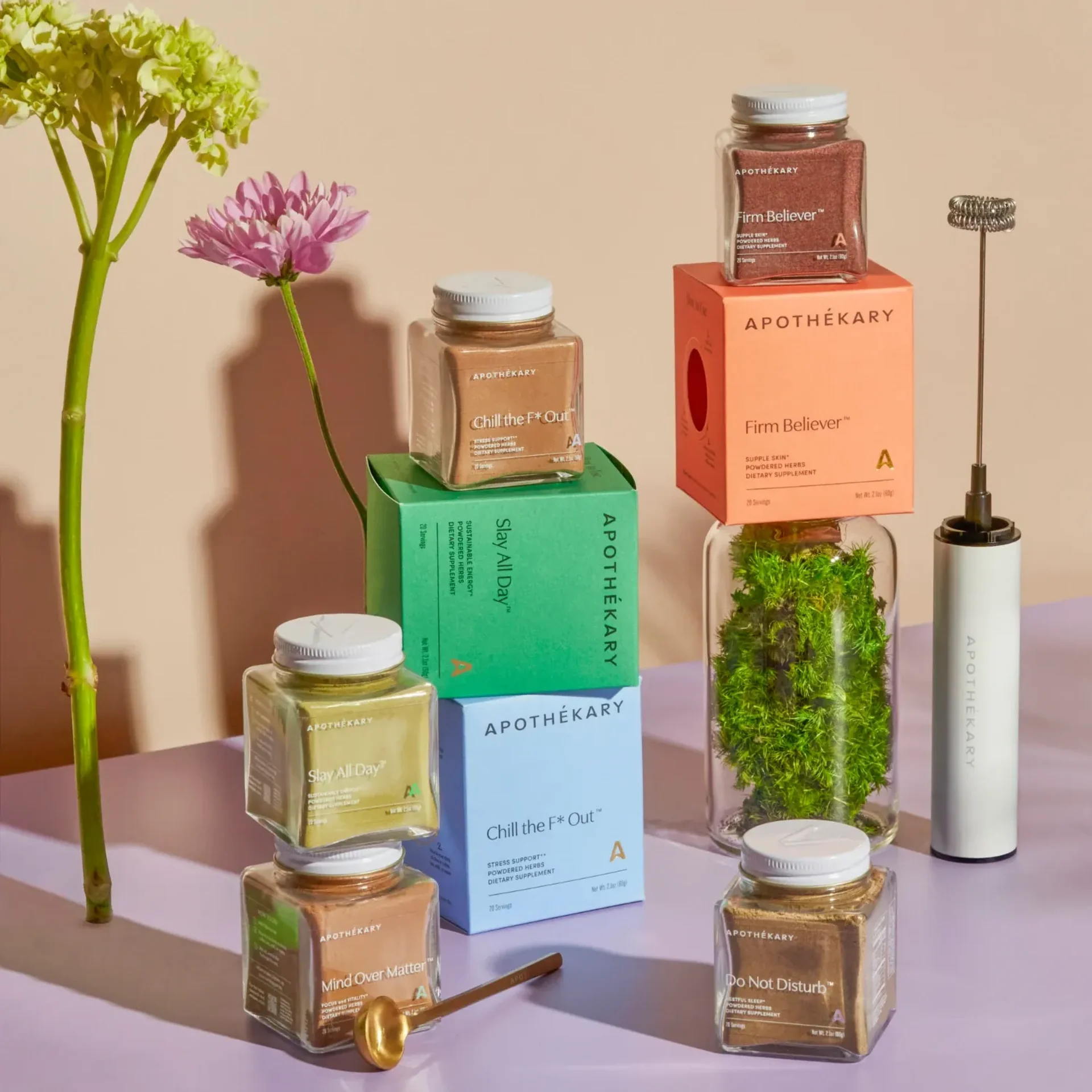 A collection of Apothékary health products on display.