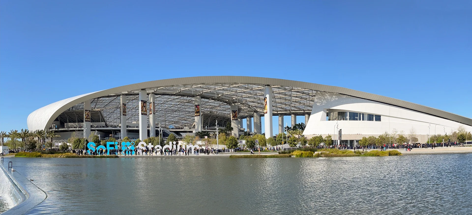 A panoramic view of SoFi Stadium, showcasing its modern architecture and surrounding landscape.