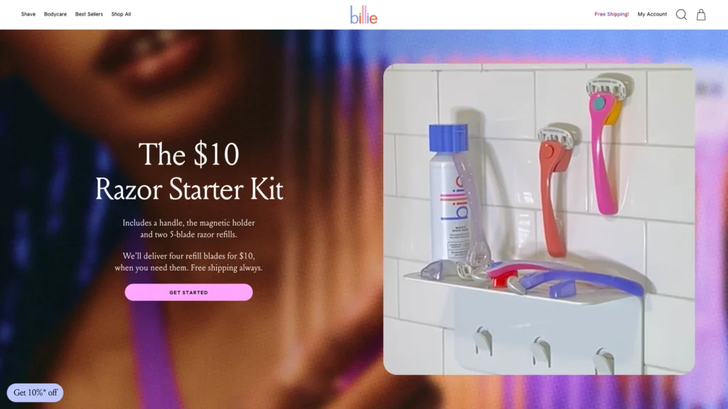 A razor starter kit displaying a magnetic holder, two razors, and a bottle labeled Billie.