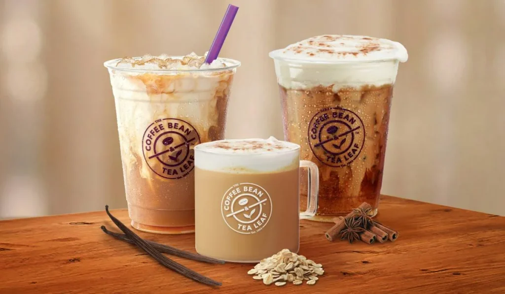 Three different drinks from Coffee Bean & Tea Leaf on a wooden table.