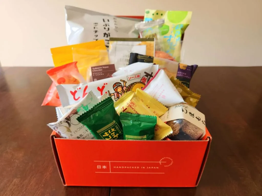 A filled box of assorted Japanese snacks and treats.