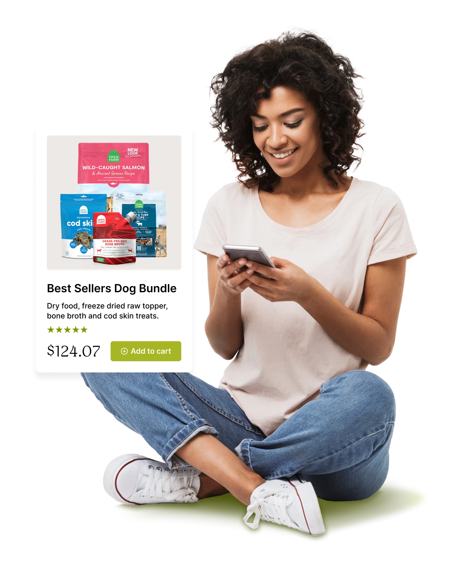 A person sitting on the floor, browsing a phone with a dog food bundle displayed on the screen.