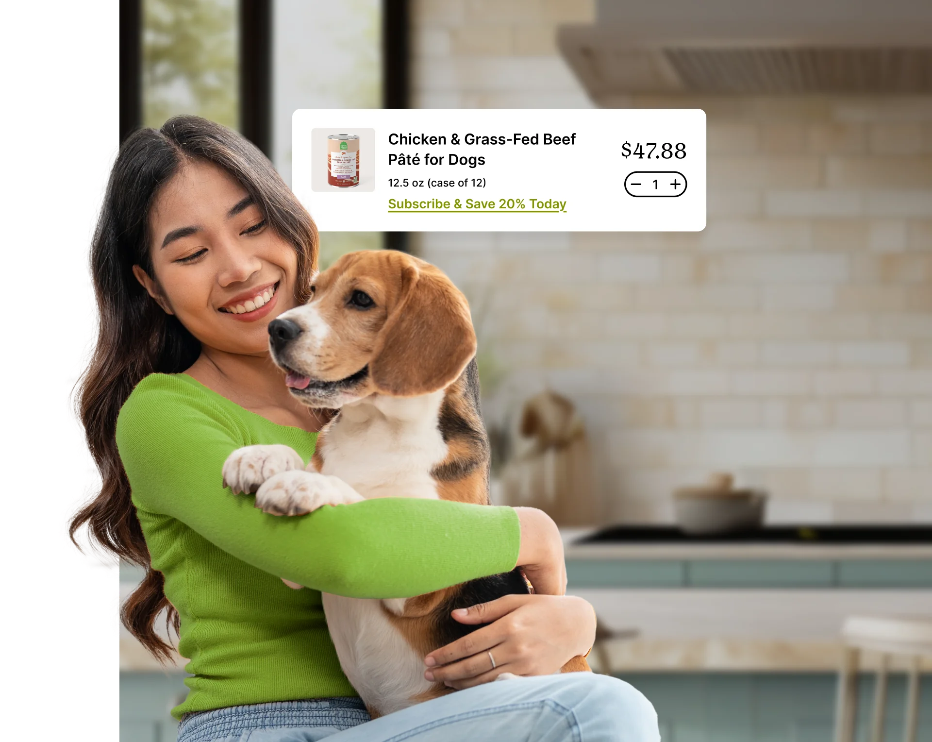 A person cuddling a dog while holding a can of Chicken & Grass-Fed Beef Pâté for Dogs.