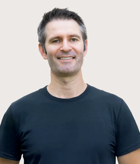 Avatar image of Mike Flynn smiling against a light background.