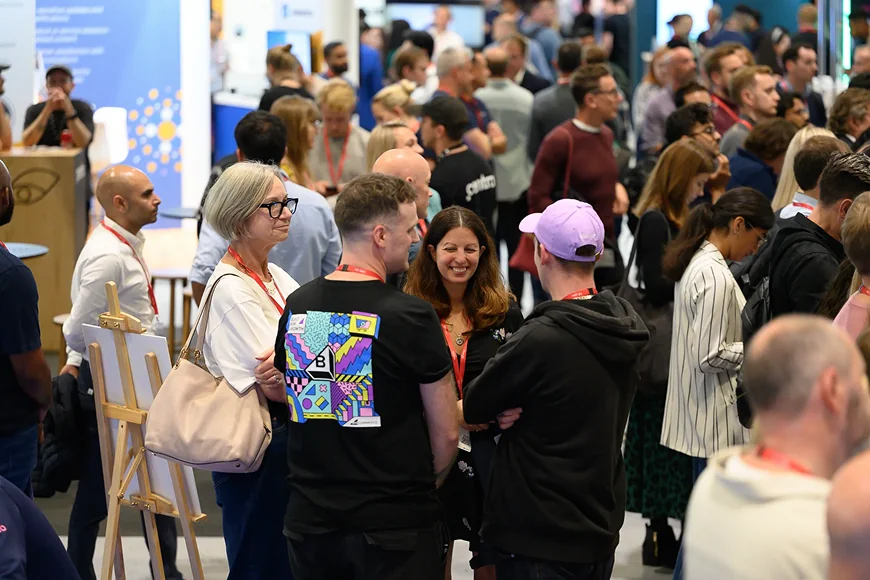 A group of people networking and engaging at an event.