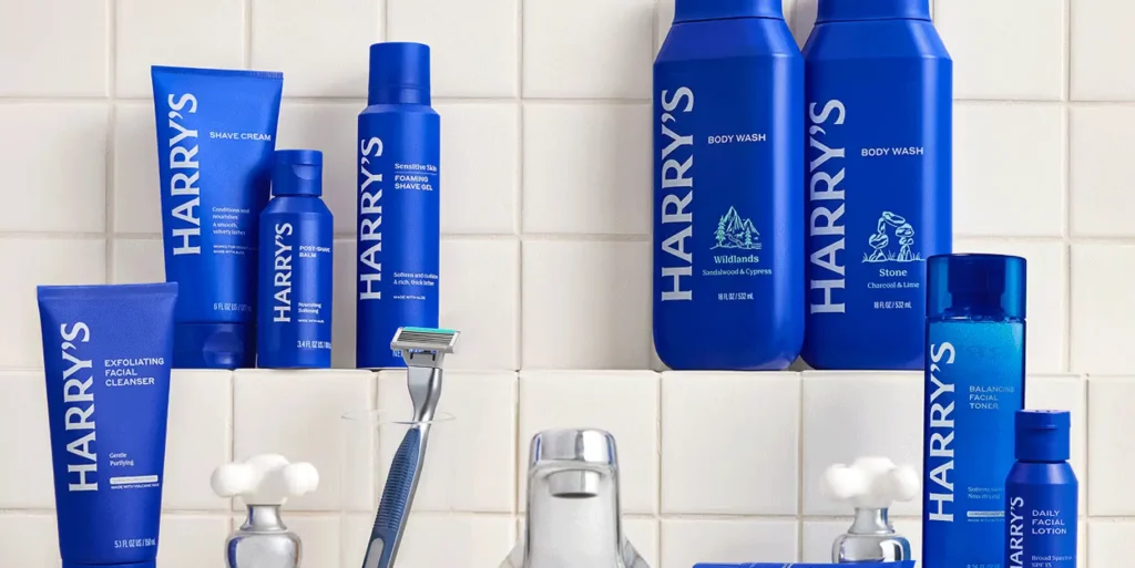 Display of various men's grooming products by Harry's including shave cream, body wash, and cleanser.
